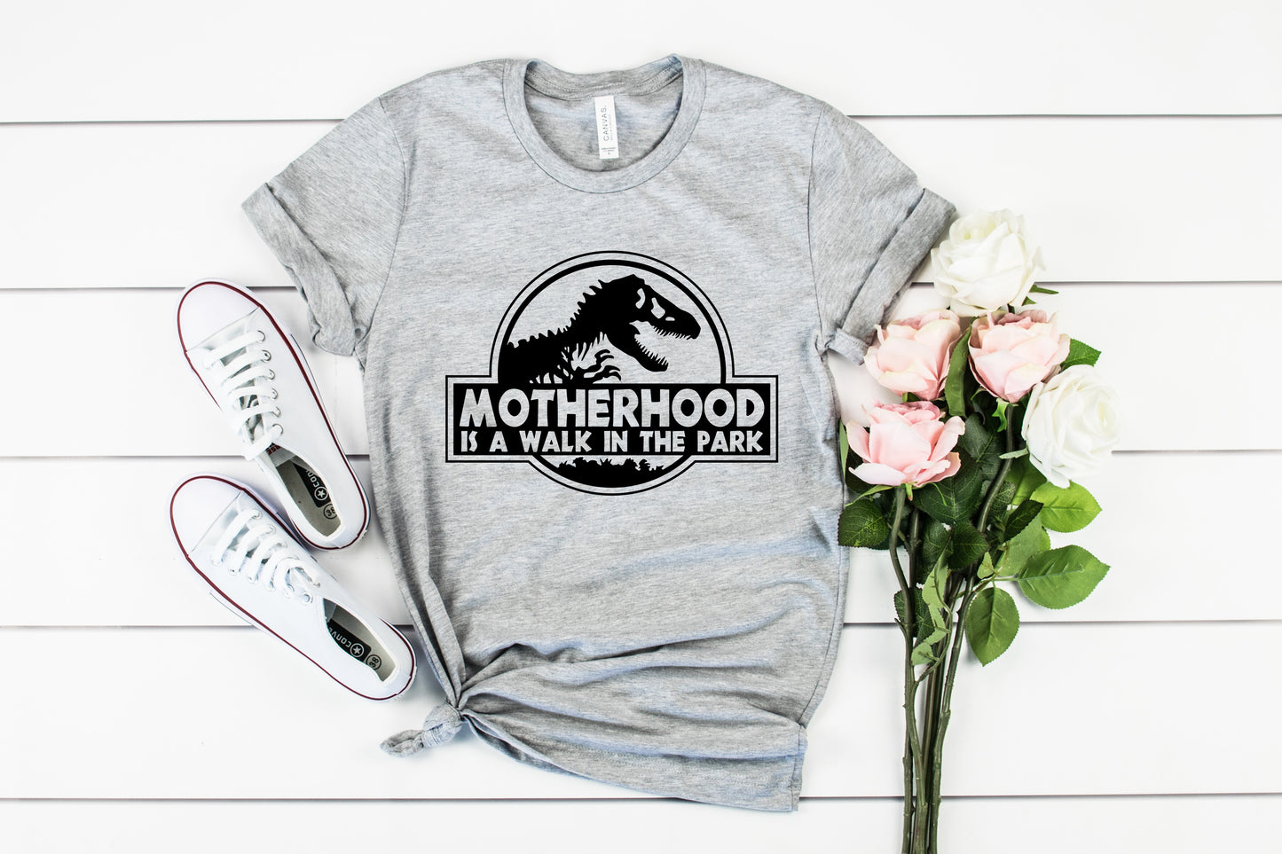 Motherhood is a Walk in the Park Bella+Canvas Premium Graphic Tee