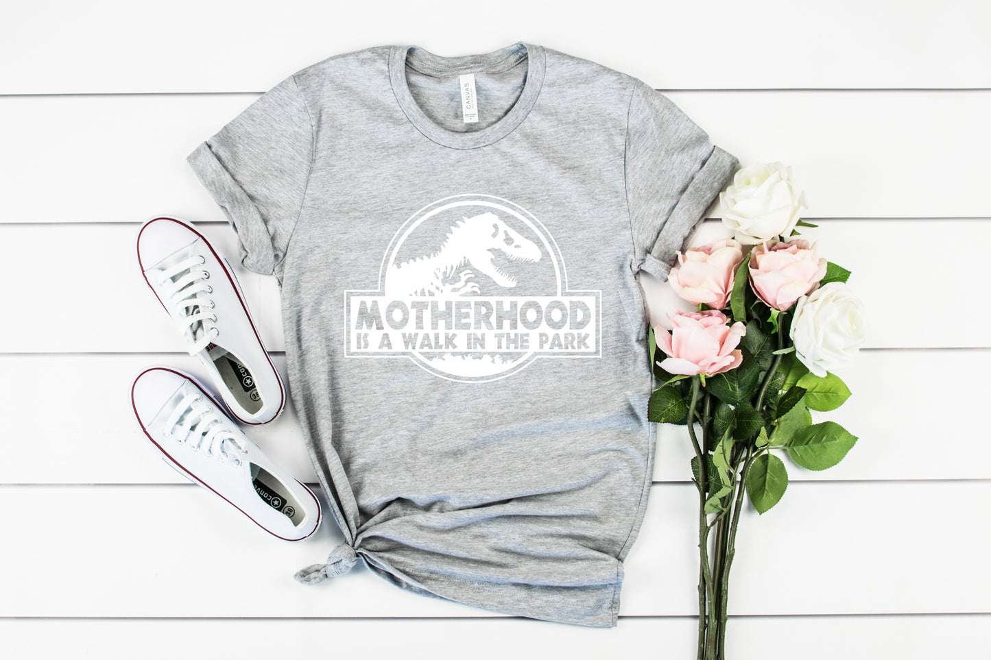 Motherhood is a Walk in the Park Bella+Canvas Premium Graphic Tee