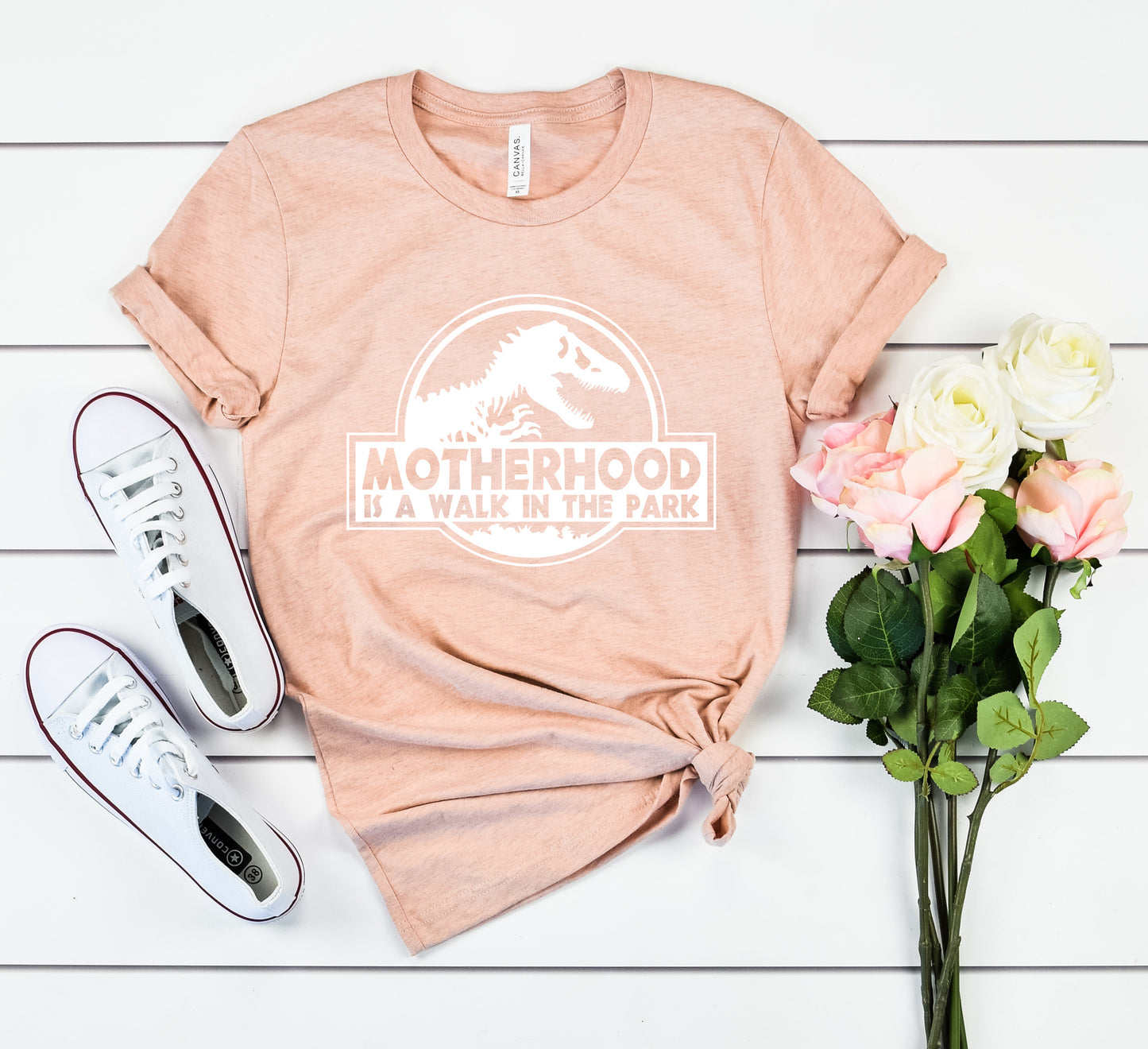 Motherhood is a Walk in the Park Bella+Canvas Premium Graphic Tee