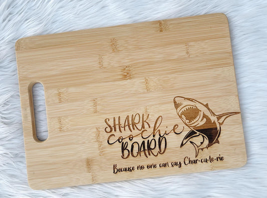 background whilte furry rug sea creature with teeth for chomping cursive wording