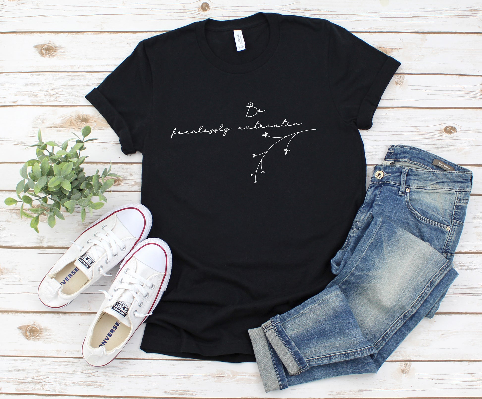 black and white lettering bushy wood background
