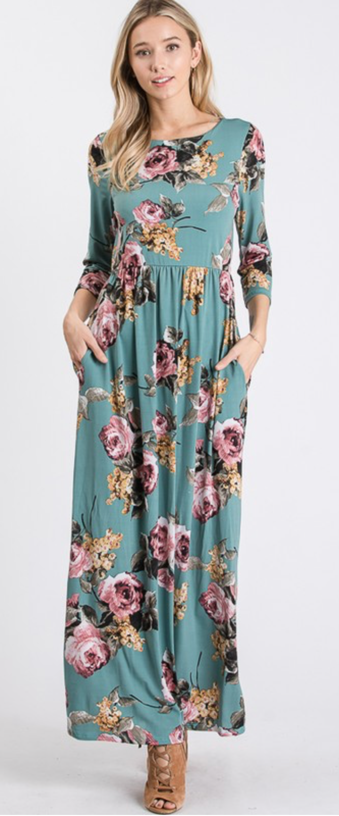 front view of model wearing long green maxi dress