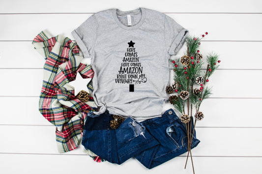 Here Comes Amazon Christmas Collection Bella+Canvas Premium Graphic Tee