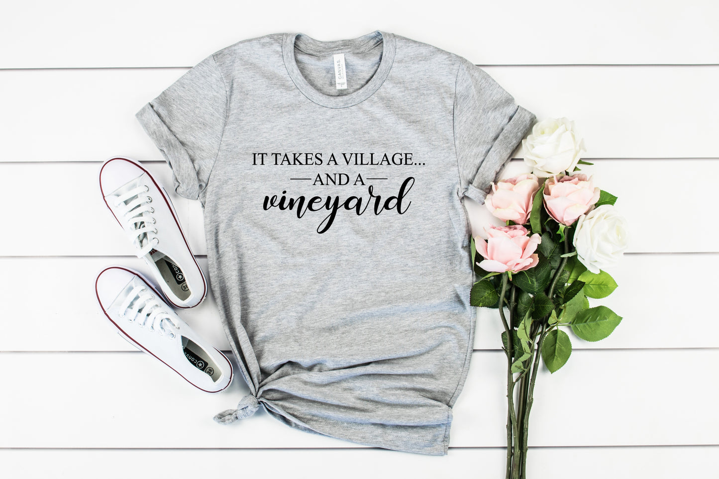 It Takes a Village Bella+Canvas Premium Graphic Tee
