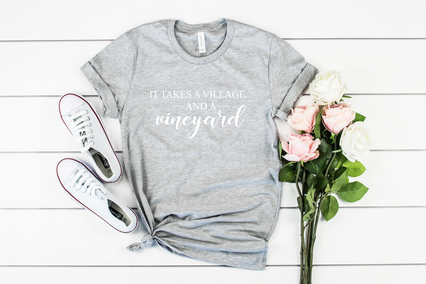 It Takes a Village Bella+Canvas Premium Graphic Tee