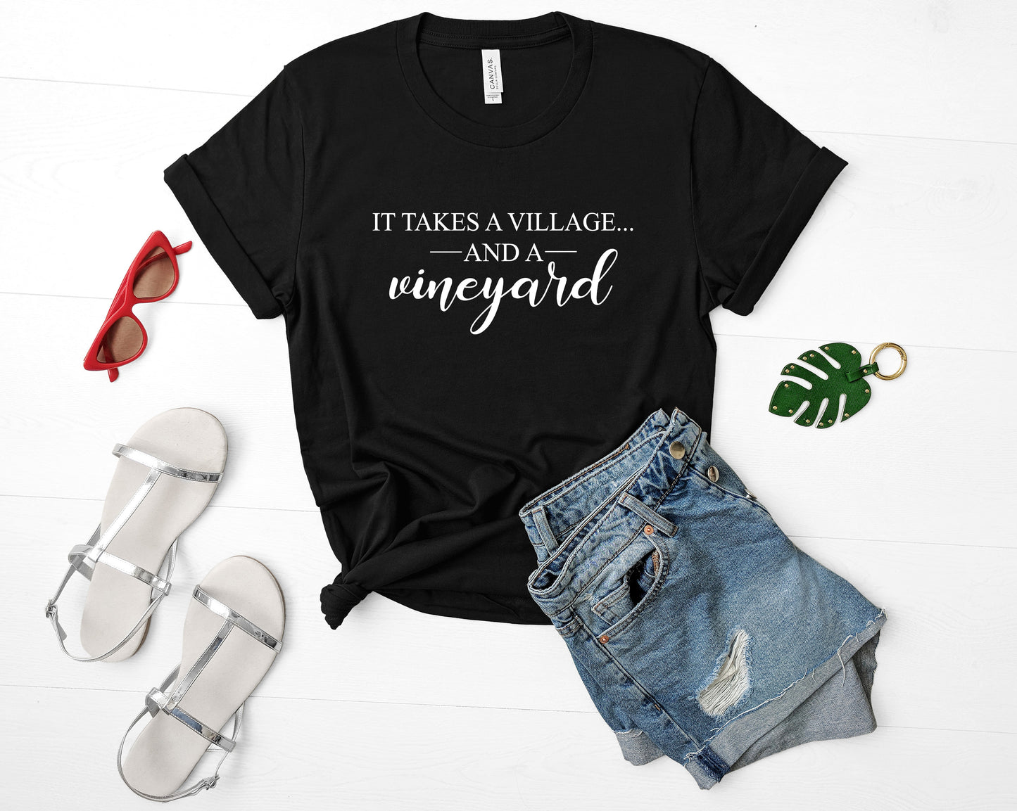 It Takes a Village Bella+Canvas Premium Graphic Tee