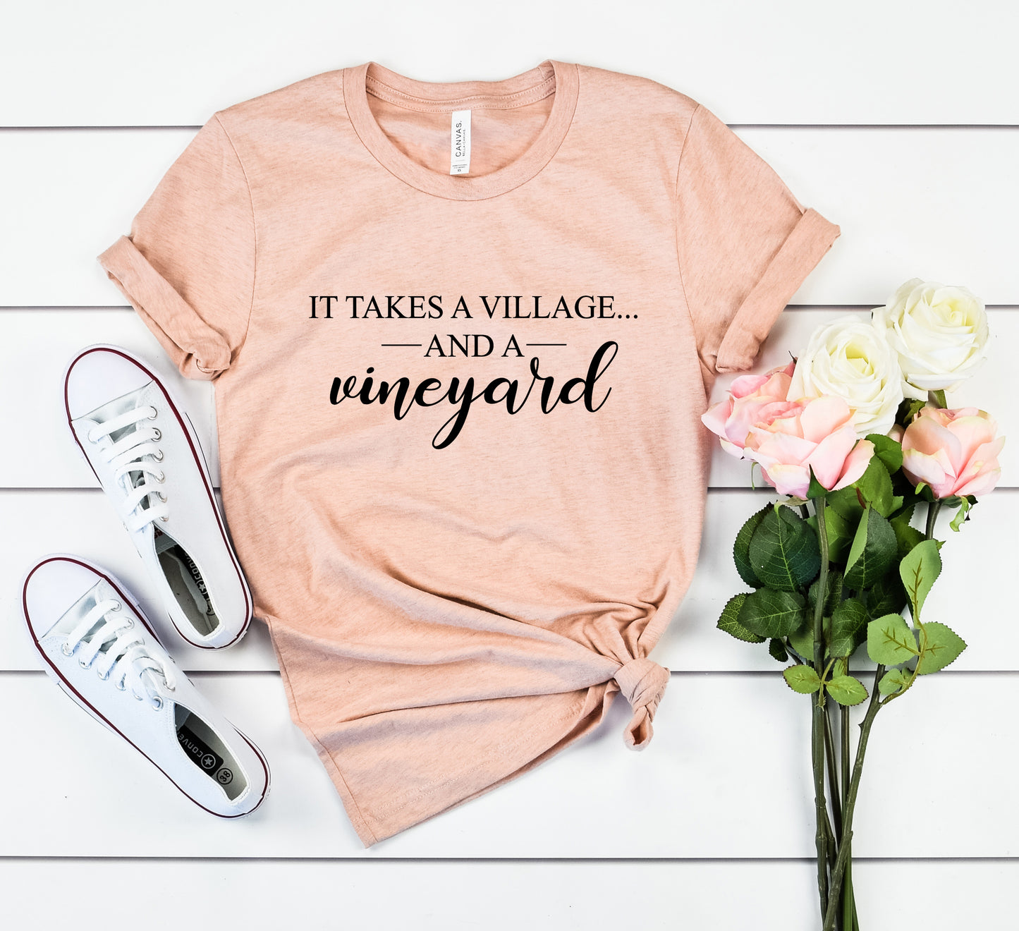 It Takes a Village Bella+Canvas Premium Graphic Tee